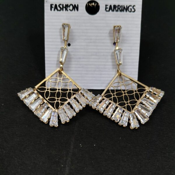 Trendy gold white AD dangle earring
